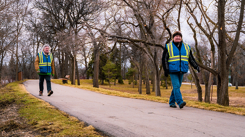 A pair of Community Service Ambassadors patrol Kildonan Park in spring 2020. 