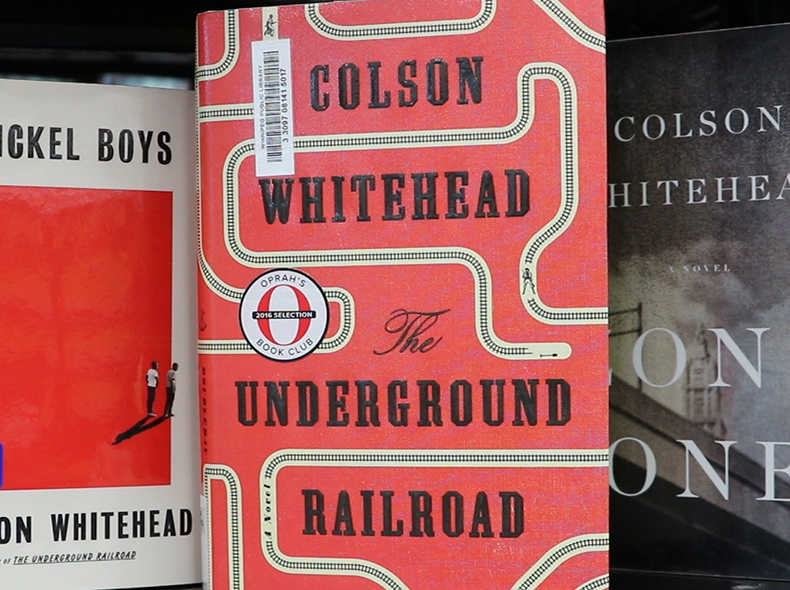 Book name is The Underground Railroad by Colson Whitehead
