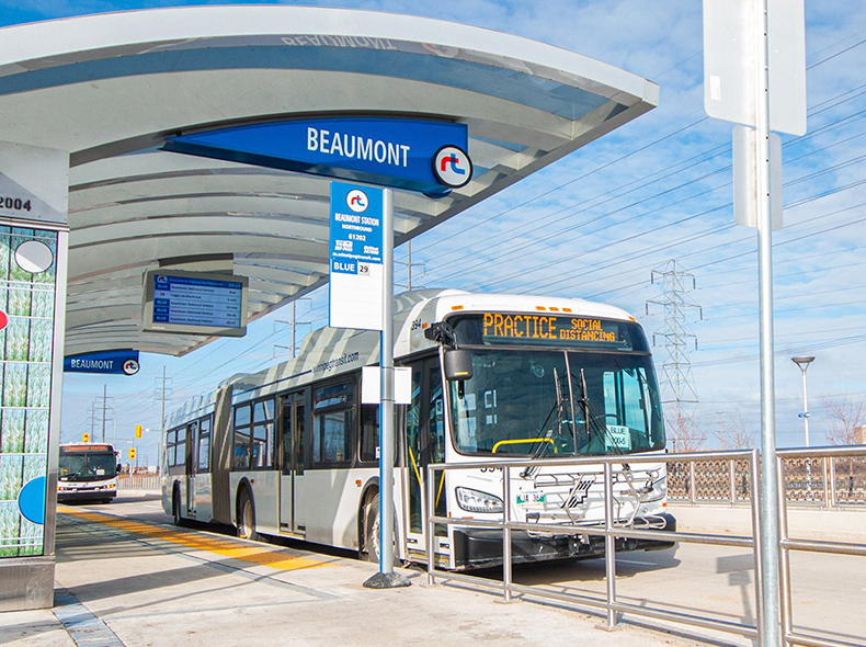 Transit bus waiting at a rapid transit stop Beaumont location