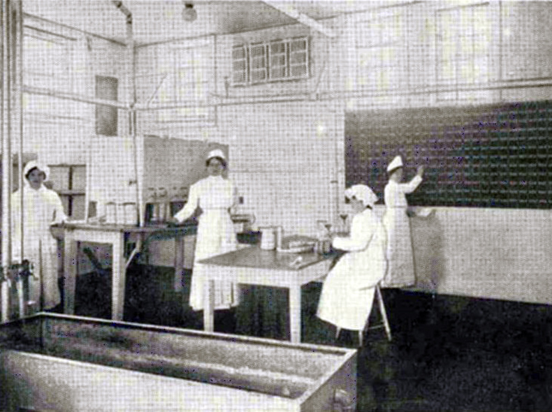 Staff in the Dispensary of the Babies Milk Depot, Department of Public Health, City of Winnipeg, 1916.