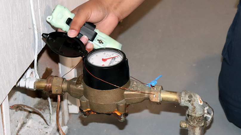 Water meter with an open lid