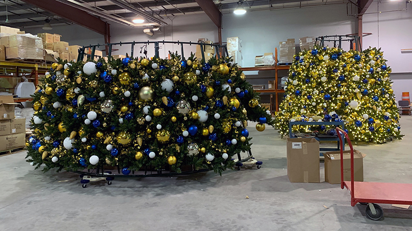 base part of a very large artificial christmas tree with ornaments