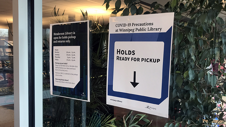Hold signage on display at library
