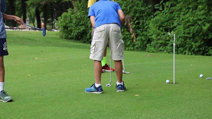 Crescent Drive Golf Course Man Putting 