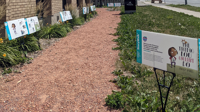 Summer Library StoryWalk path