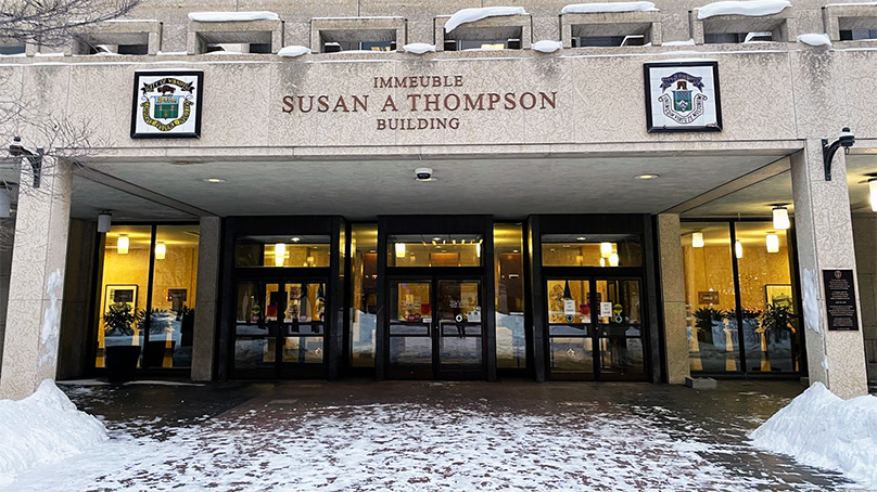 Susan A Thompson building with the two City crests.