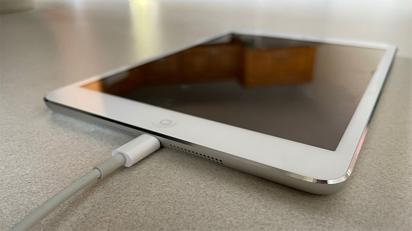 iPad charging on a flat surface