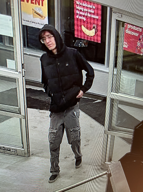 Suspect entering a store