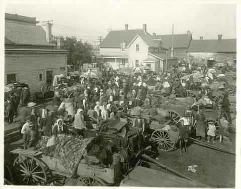 An archival photo of an outdoor market.