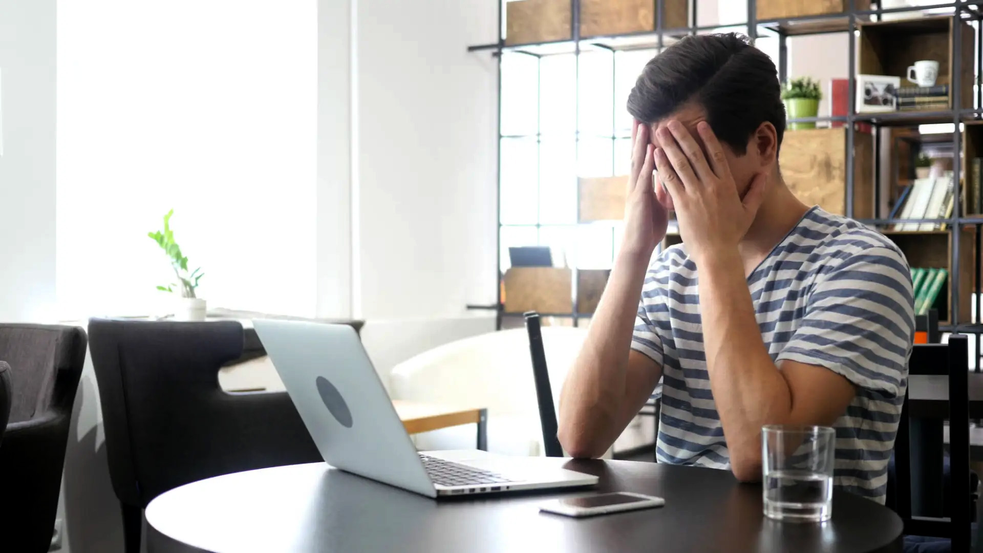 Man fretting at computer