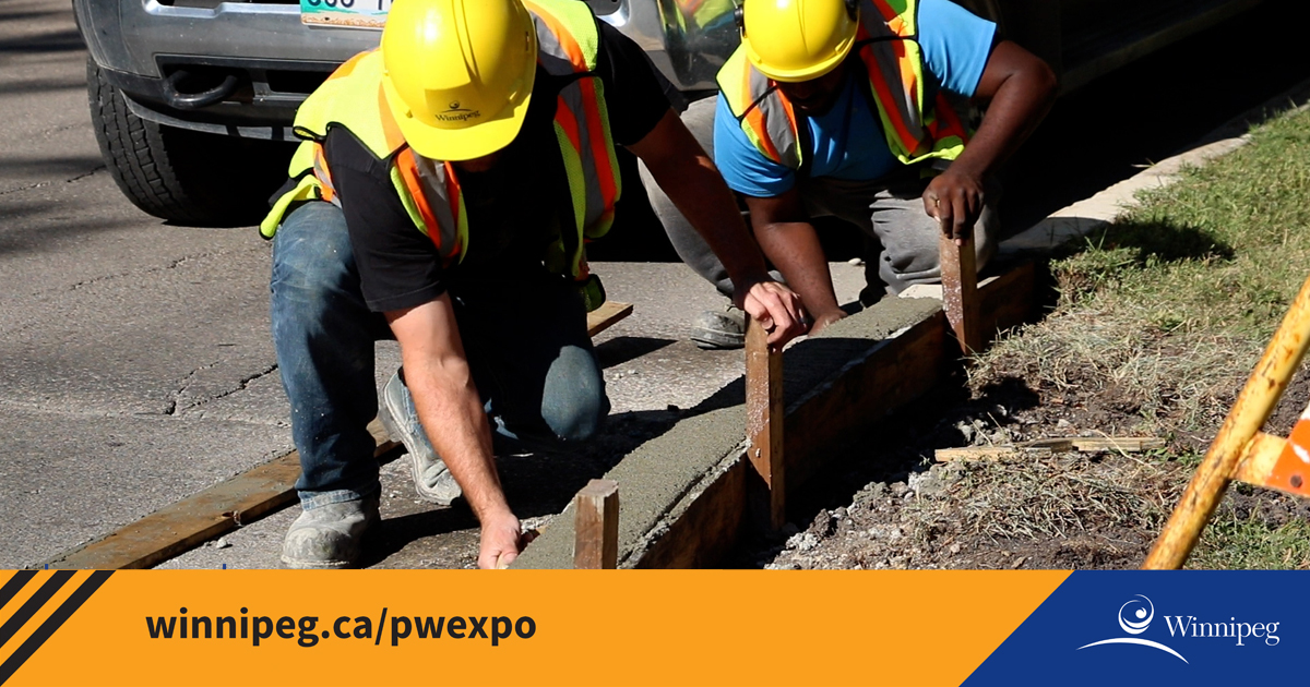 Crews build a new curb