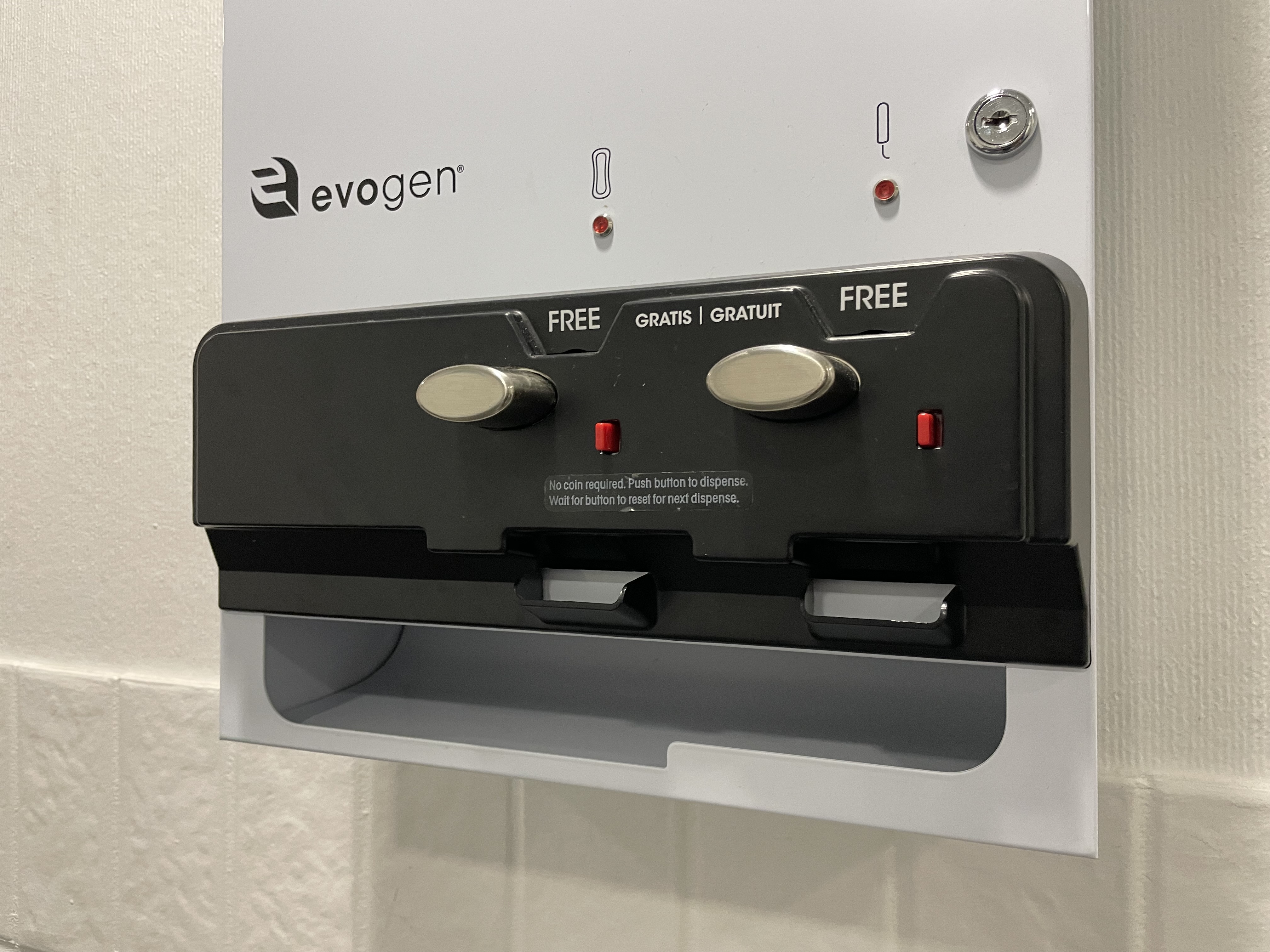 A machine offers free pads and tampons.