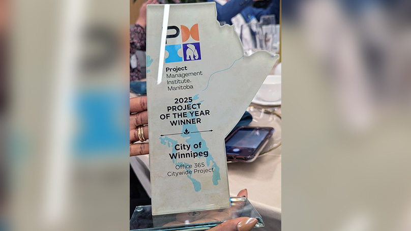 Award shaped like the province of Manitoba given for 2025 Project of the Year