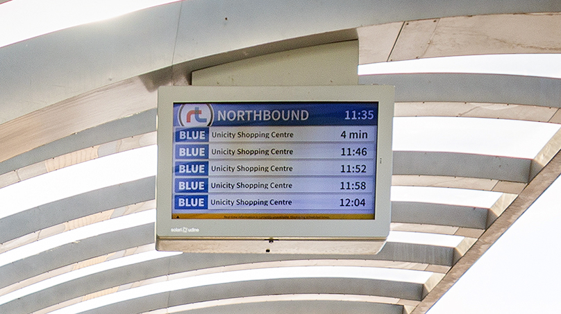 Winnipeg Transit bus stop display showing arrival times for BLUE routes