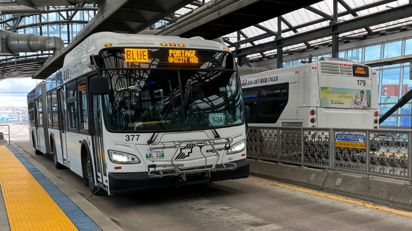 Transit bus at a station