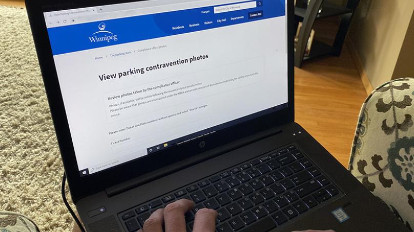 Laptop with new parking ticket tool on the screen