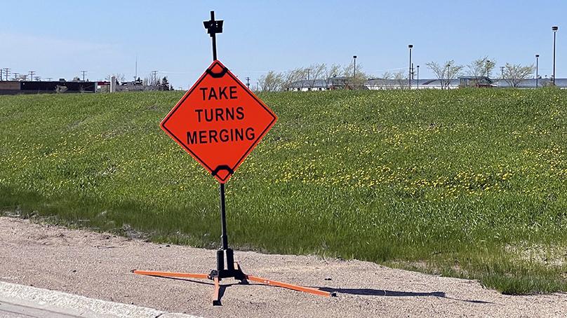 Look for signs like this one at road construction sites this summer as a reminder to practice zipper merging.