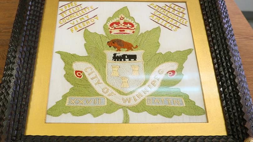 This piece was embroidered by Winnipeg-based solider Herbert Clark during the First World War
