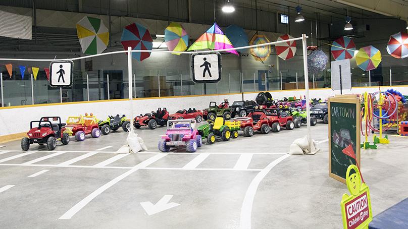 Many different toy vehicles lined up at Cartown in the Sam Southern Arena.
