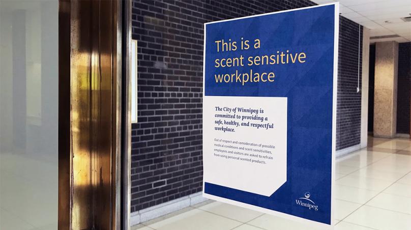 Scent sensitive workplace poster on window of building