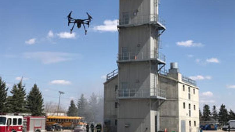 Drone hovering by building