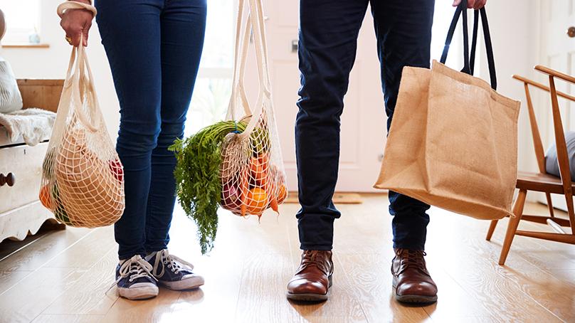 Carrying plastic free bags with groceries