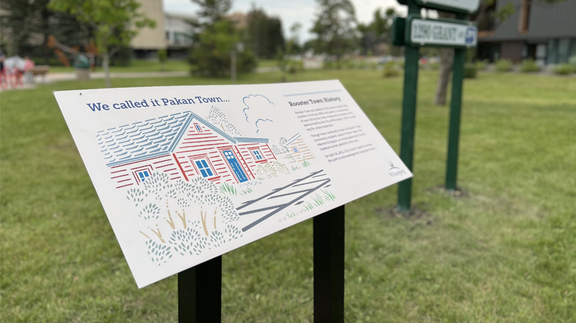 A plaque in Rooster Town Park showcases the park's history