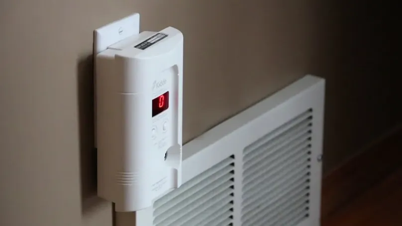 carbon monoxide detector plugged into wall