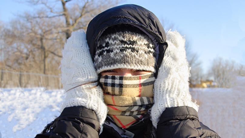 person dressed warm outside in winter
