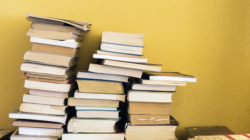 Stacks of books on a table