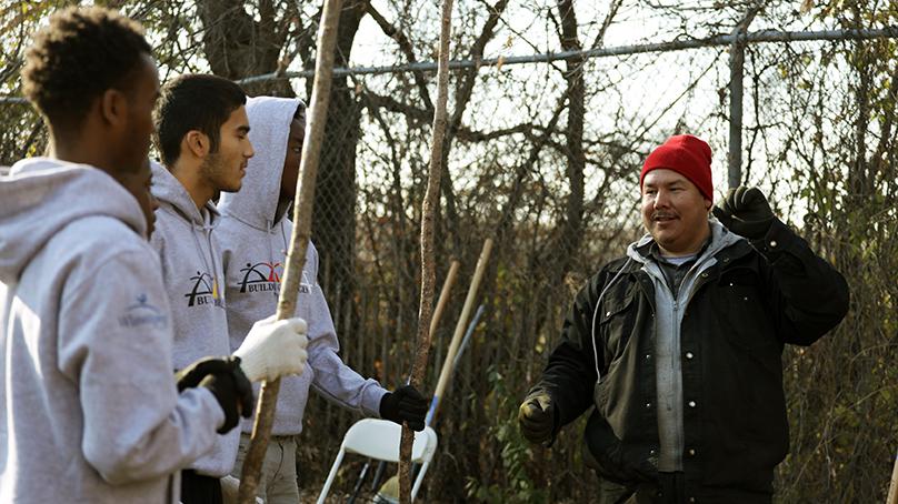 Two young people take part in traditional Anishinaabe (Ojibway) and Ininew (Cree) teachings