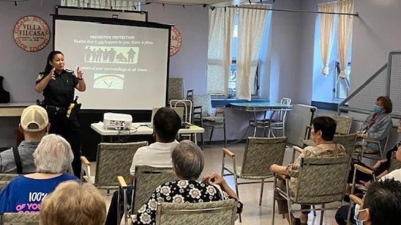 Officer giving a presentation to a group of people