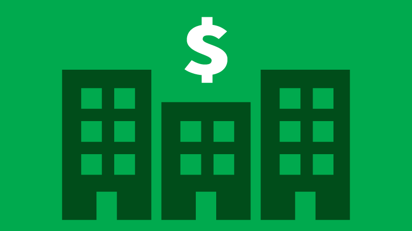 dollar sign above tall buildings