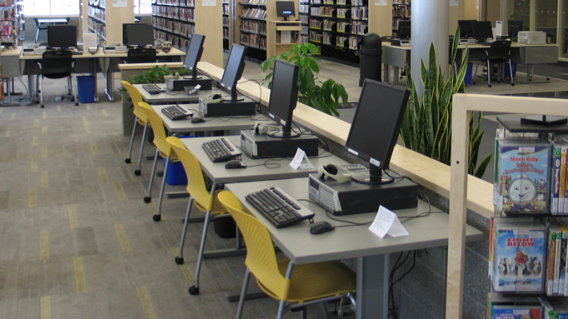 A row of computer terminals
