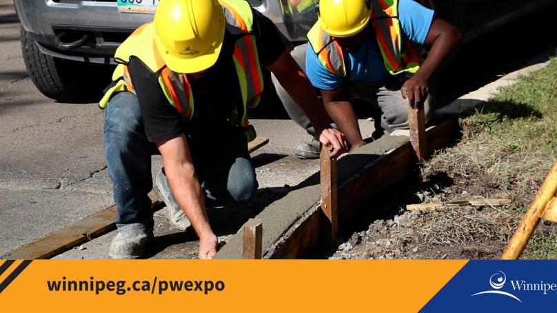 Crews build a new curb