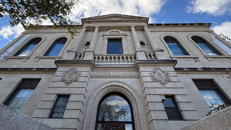 Exterior of the Carnegie Library looking up towards the sky