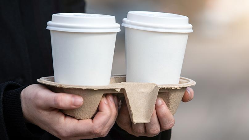 To go coffee cups in a tray