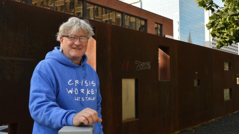 Community Crisis Worker, Bruce, standing in Millennium Park.