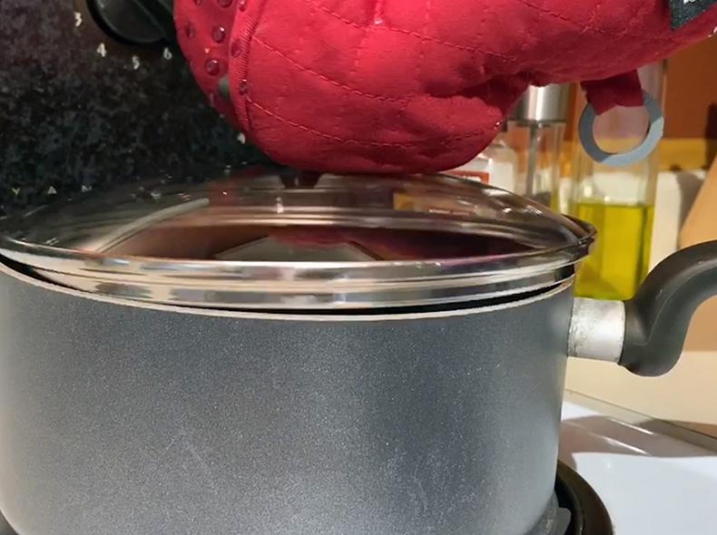 Keep a lid nearby and cover a pot or pan if a fire breaks out.