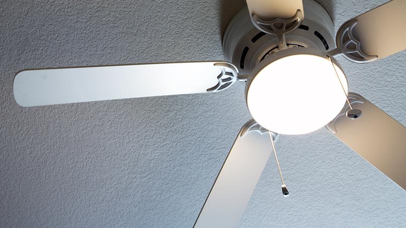 Set ceiling fans to rotate counter-clockwise in the summer to create a downdraft.