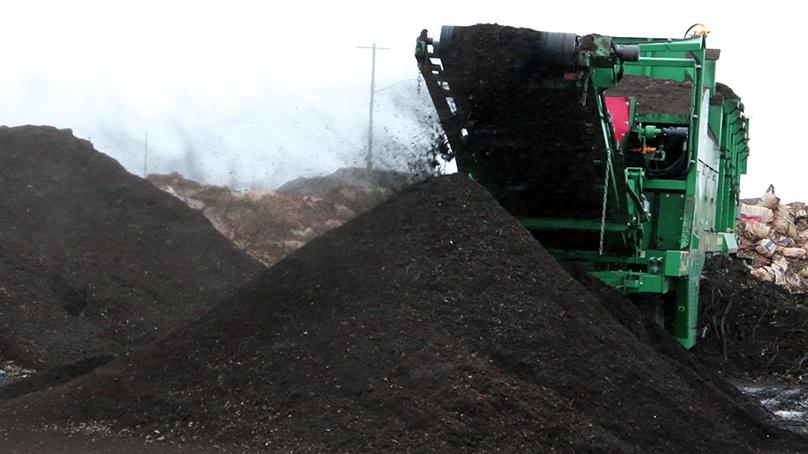 The compost is sifted to remove any large materials.