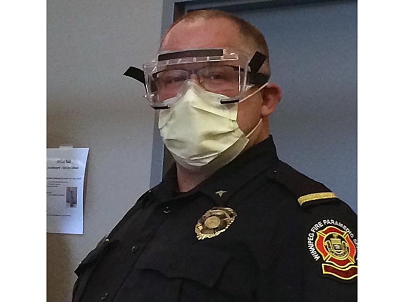 A Paramedic Training Officer prepares for a PPE presentation