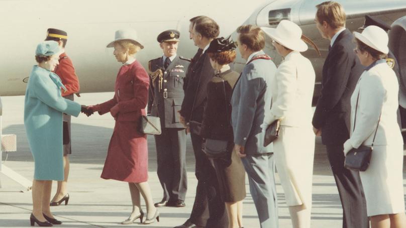 Royal Tour, Winnipeg, October 4, 1984. Queen Elizabeth II shaking hands with Pearl McGonigal, Lieutenant Governor of Manitoba, as Winnipeg Mayor Bill Norrie, Premier Howard Pawley, and others wait in receiving line. City of Winnipeg Archives