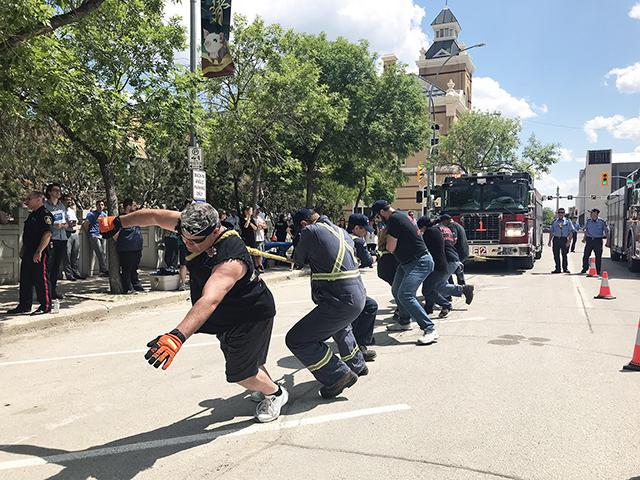 The Fire Engine Pull serves as the annual City of Winnipeg Charitable Fund campaign kickoff.