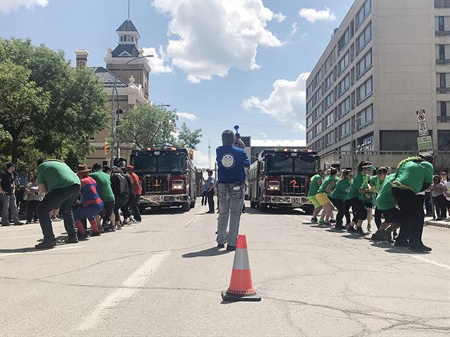 The Fire Engine Pull serves as the annual City of Winnipeg Charitable Fund campaign kickoff.
