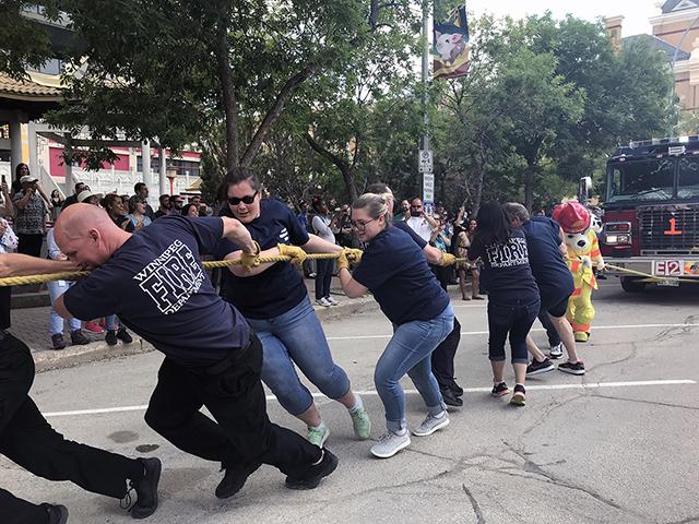 The Fire Engine Pull serves as the annual City of Winnipeg Charitable Fund campaign kickoff.