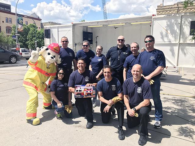 The Fire Engine Pull serves as the annual City of Winnipeg Charitable Fund campaign kickoff.