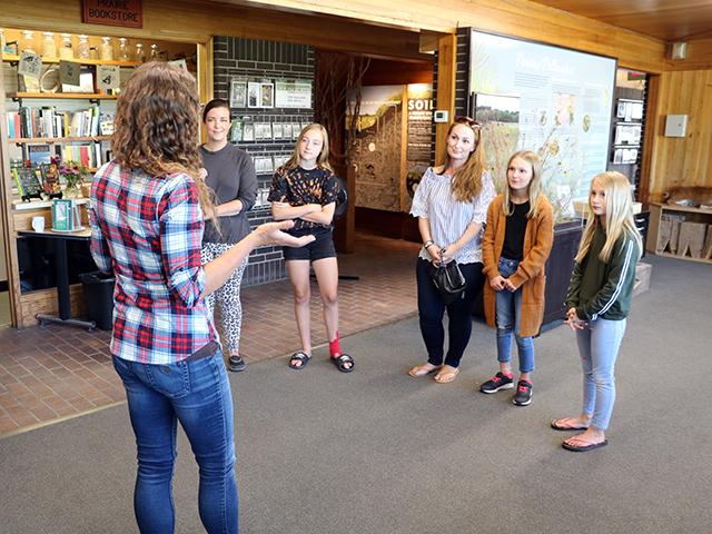 The Loving Lemons Lemonade Stand organizers were given a tour of the Living Prairie Museum to learn more about pollinator conservation.