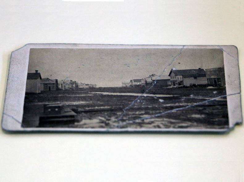 Two photographs of Main Street taken in 1871 and 1872 were given to the City in 1924.