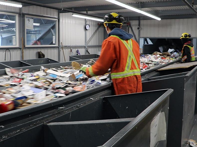 Some manual sorting is required to separate items not sorted by machines and materials that aren't accepted.
